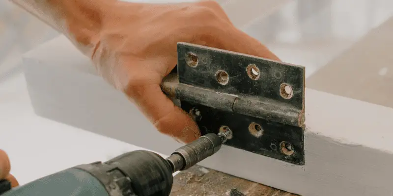 how to attach metal to wood