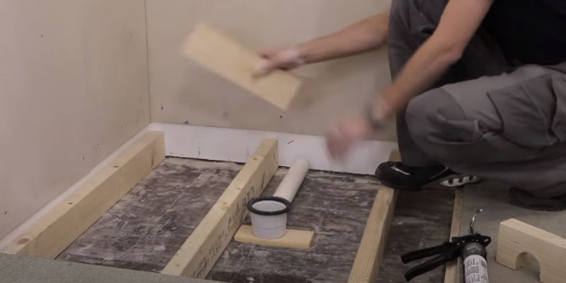 How to  Install a Shower Base on a Wooden Floor