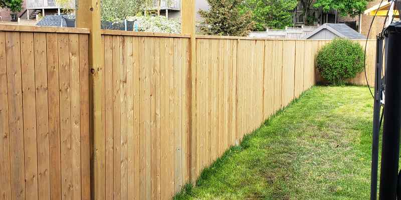 How to Build a Wood Fence on a Slope