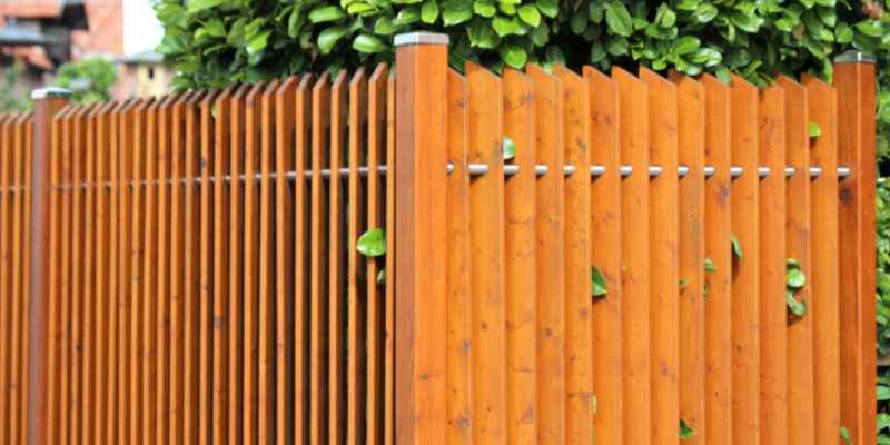 Should I Use Pressure Treated Wood for Fence Rails