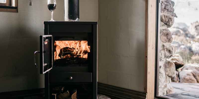 Wood Burning Stove in Corner of Room