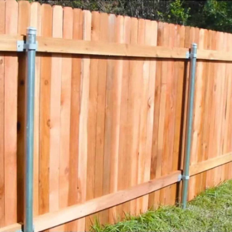 How to Build a Wood Fence Using Metal Posts