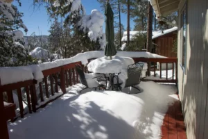 Should Snow Be Removed From a Deck?
